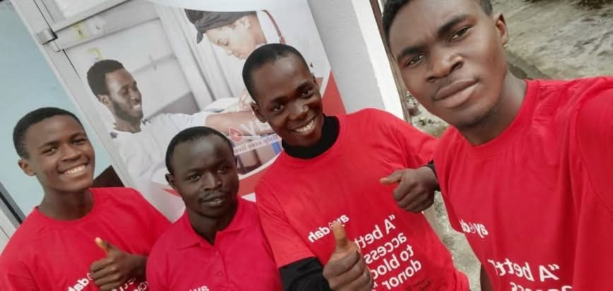 The Ayodah team with a partner organisation during a community outreach.